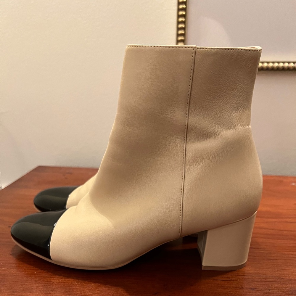 Stuart Weitzman Classic bootie in soft beige leather with a patent leather cap
